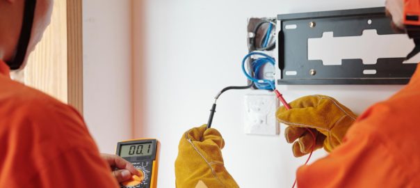 Electricians Testing Electrical Wires - LC Electrical Services